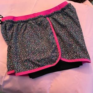 Nike shorts with added black short.